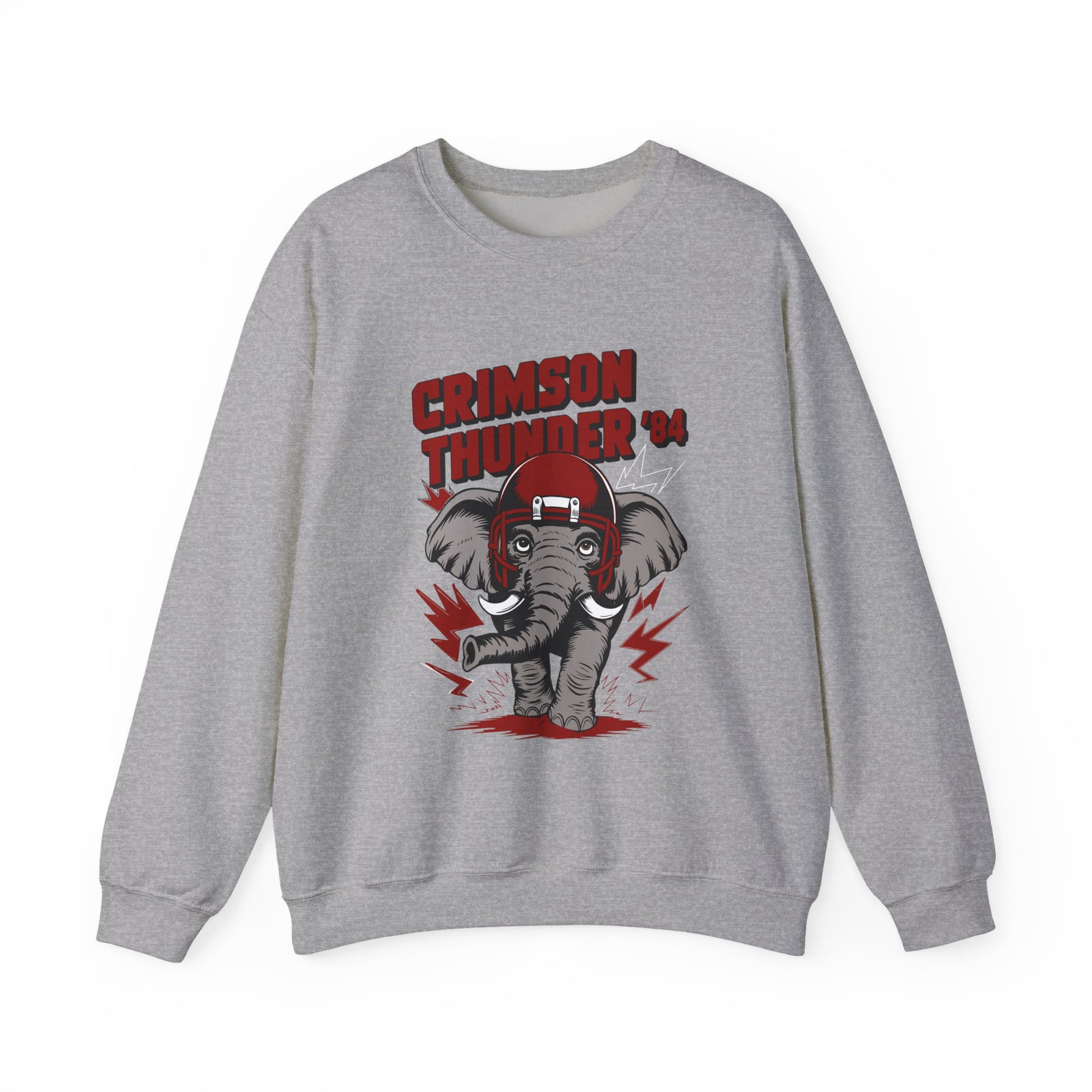 Gray crewneck sweatshirt with a large red and gray "Crimson Thunder" elephant mascot graphic wearing a football helmet and a white eye-mask. The elephant is depicted with red lightning bolts around it, and the design has a vintage, worn look.