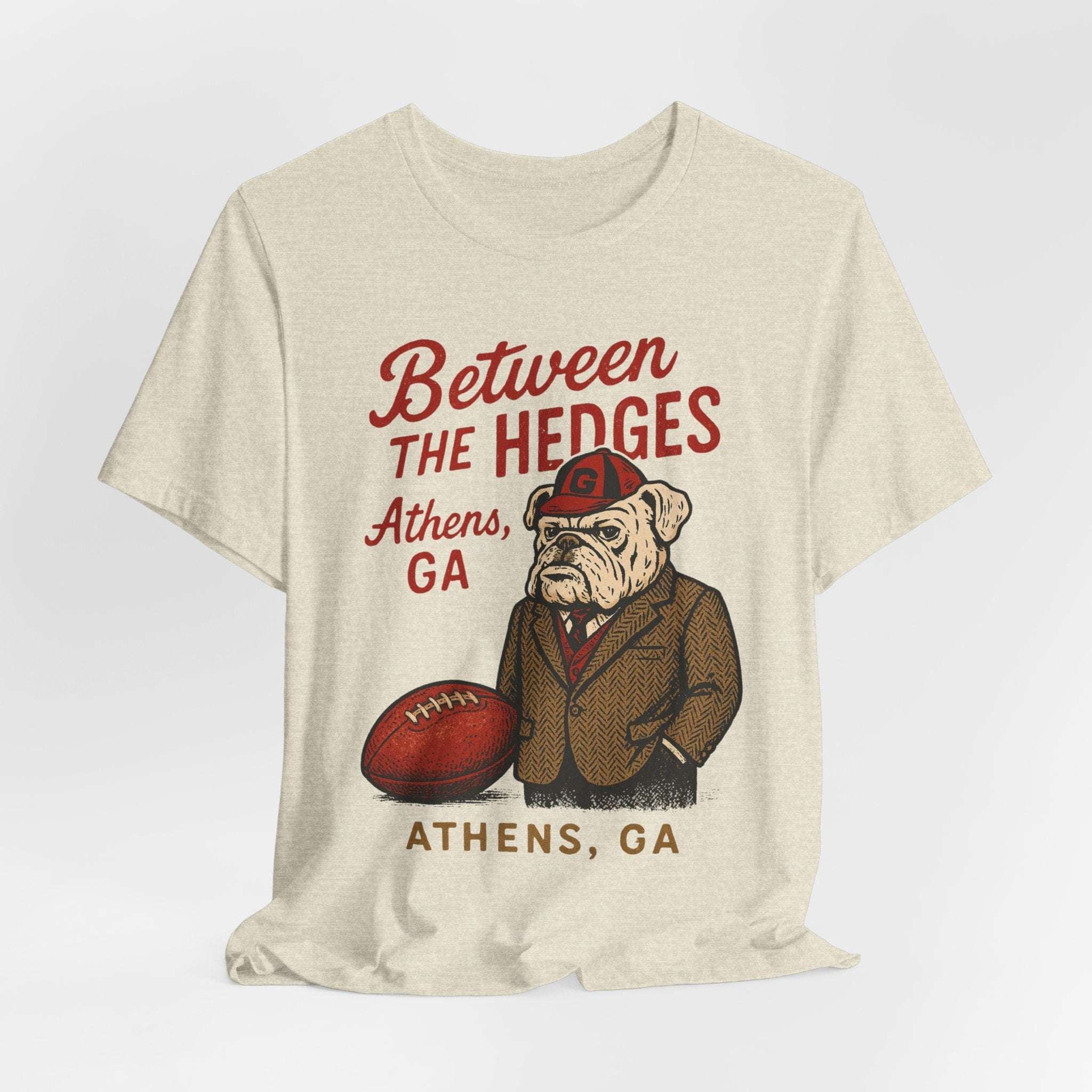 Between the Hedges Athens GA Game Day Tee”.