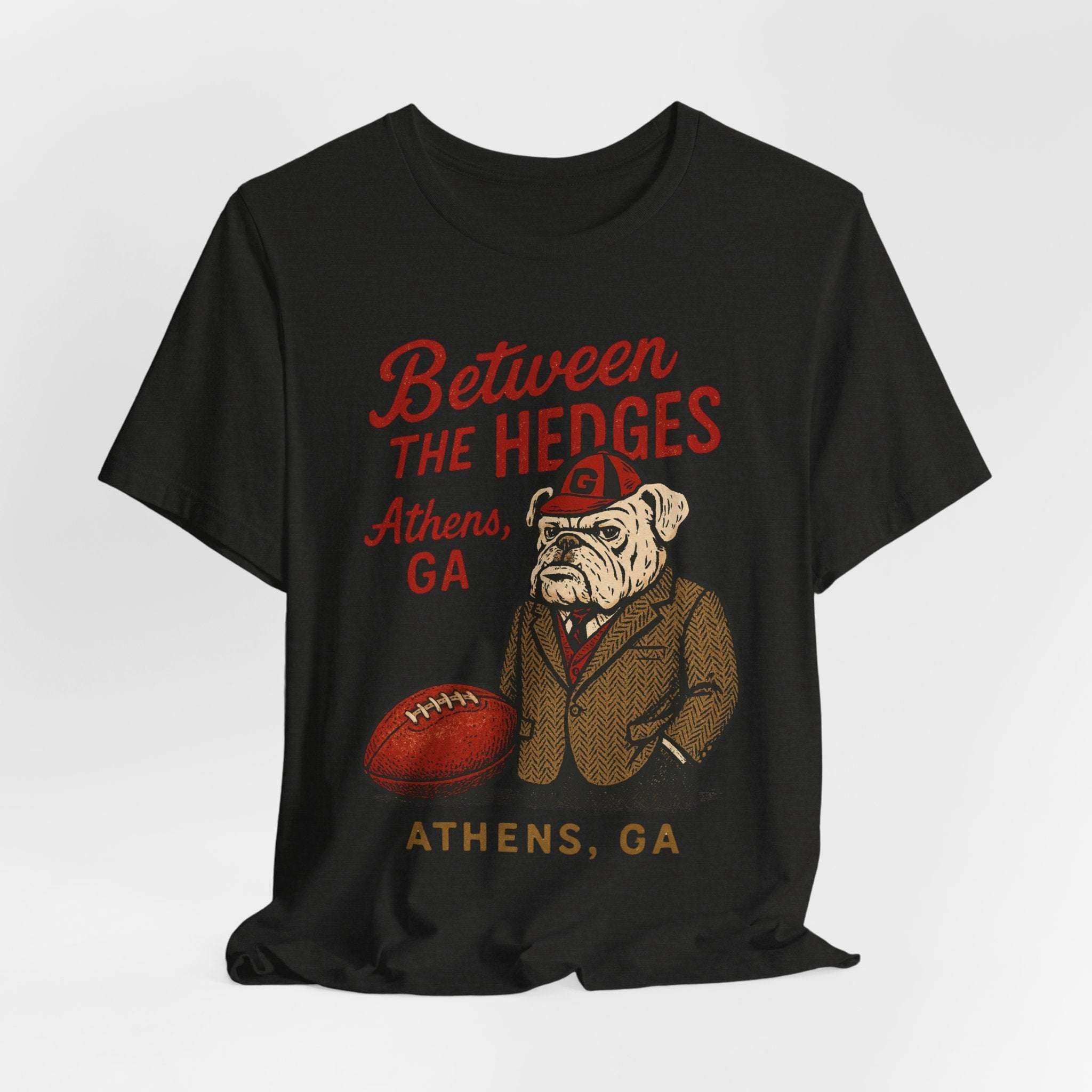 Between the Hedges Athens GA Game Day Tee”.