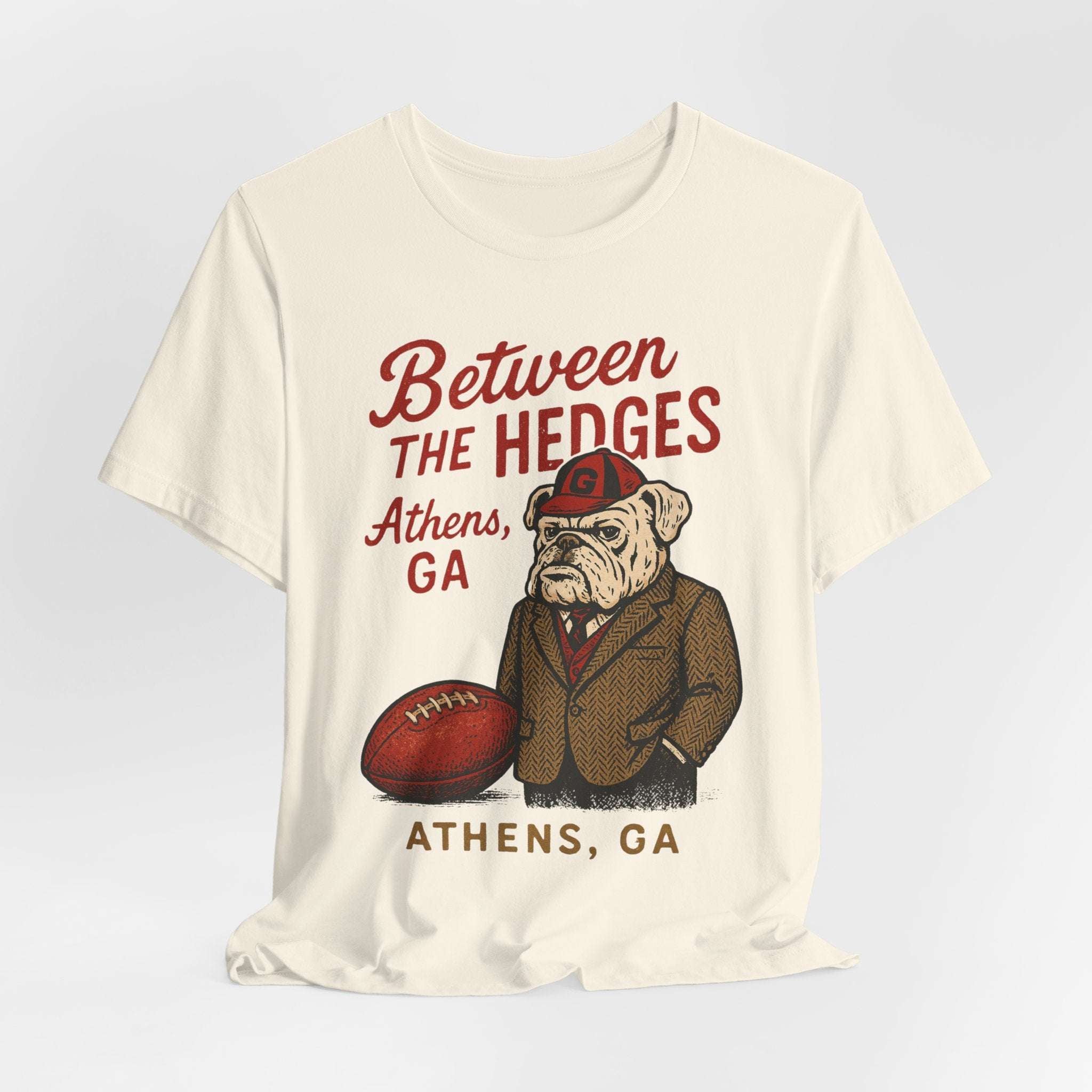 Between the Hedges Athens GA Game Day Tee”.